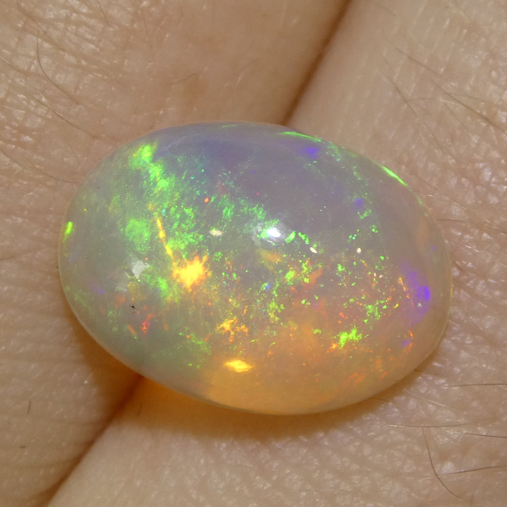 3.45ct Oval Cabochon White Crystal Opal from Ethiopia - Skyjems Wholesale Gemstones