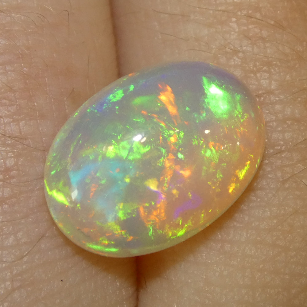 4.29ct Oval Cabochon White Crystal Opal from Ethiopia - Skyjems Wholesale Gemstones