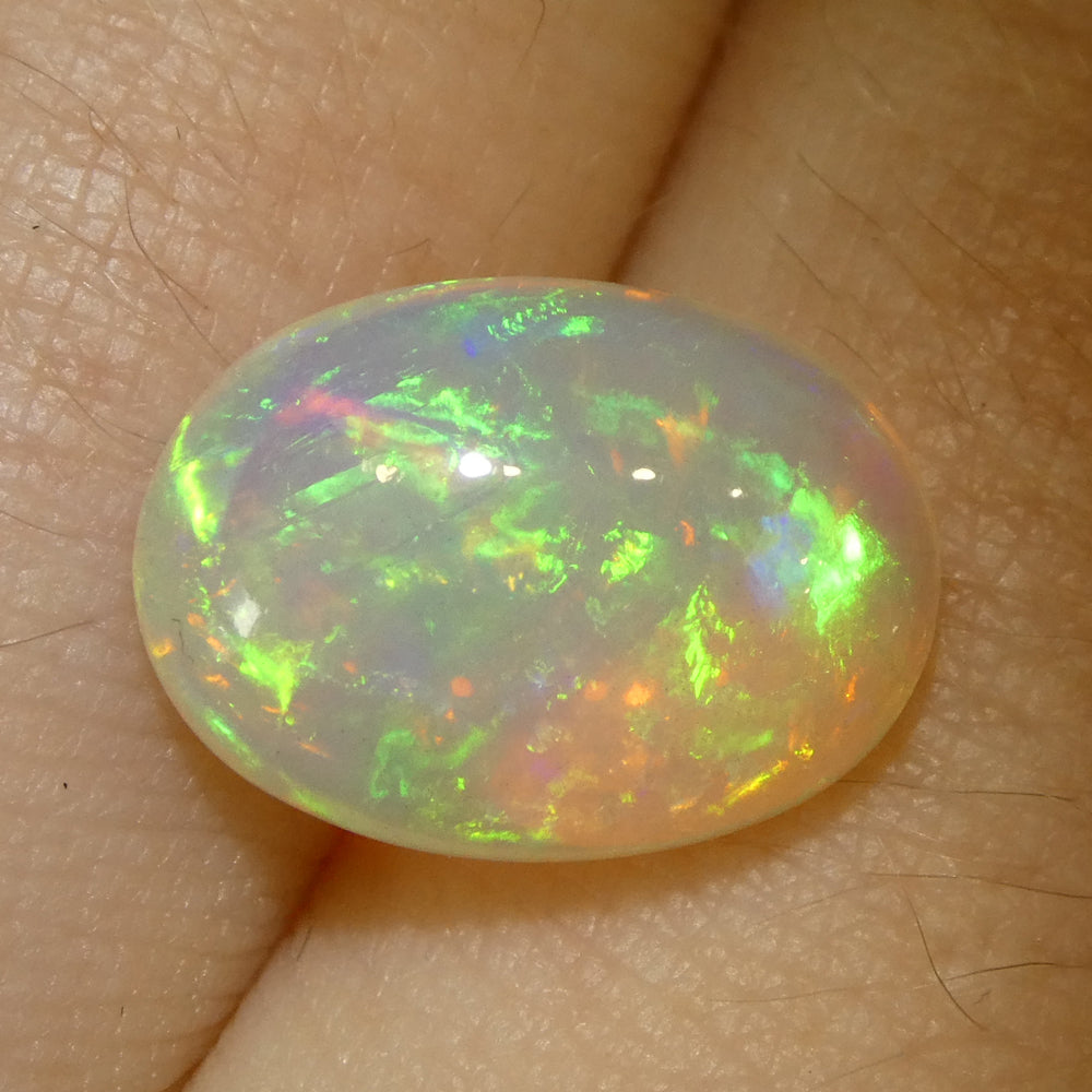 4.29ct Oval Cabochon White Crystal Opal from Ethiopia - Skyjems Wholesale Gemstones