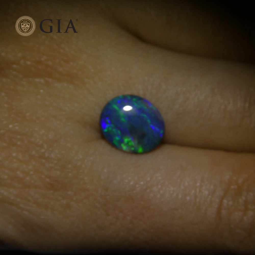 1.71ct Oval Cabochon Black Opal GIA Certified - Skyjems Wholesale Gemstones