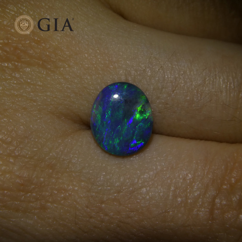 1.71ct Oval Cabochon Black Opal GIA Certified - Skyjems Wholesale Gemstones