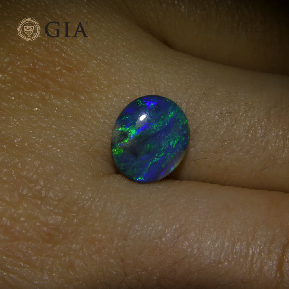 1.71ct Oval Cabochon Black Opal GIA Certified - Skyjems Wholesale Gemstones