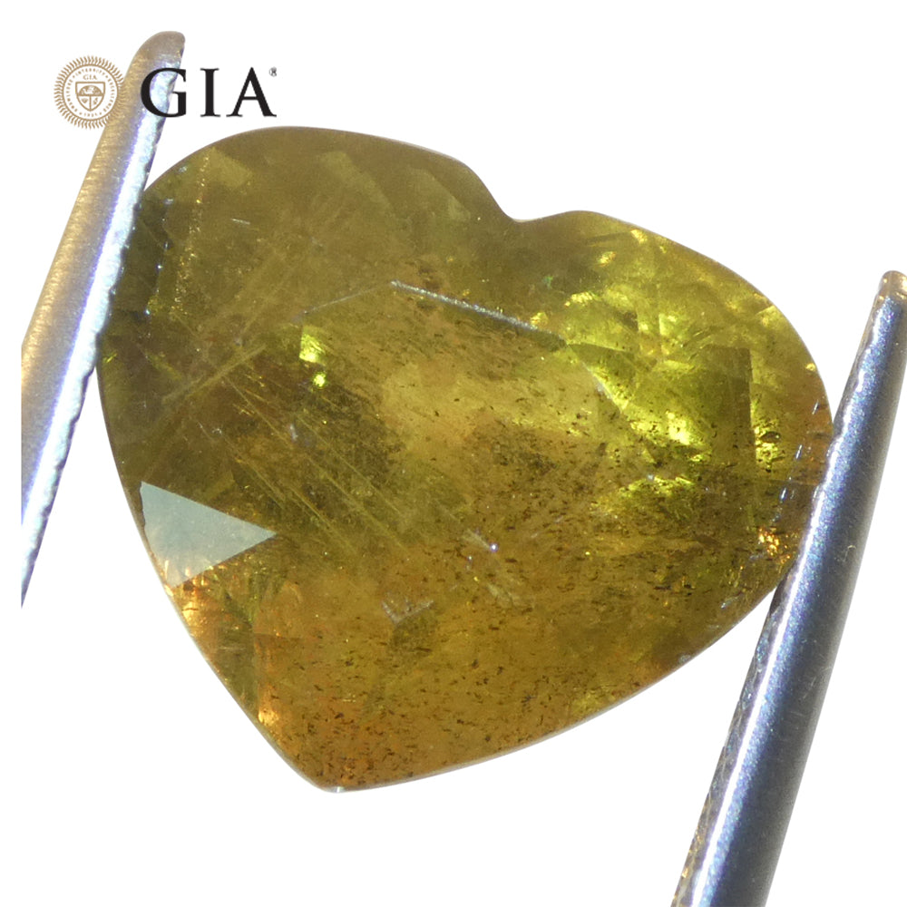 Sapphire 9.64 cts 11.34 x 13.43 x 8.57 mm Heart Brown-Yellow changing to Pinkish Brown  $6400
