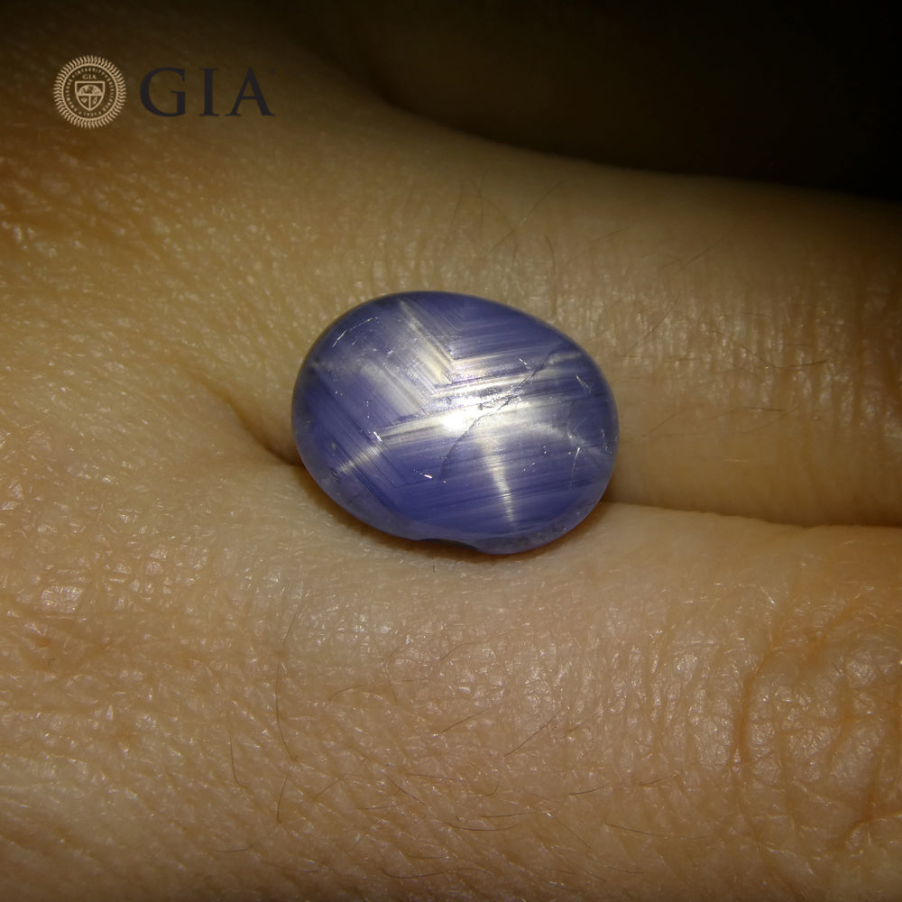 10.77ct Natural Blue Star Sapphire Oval Cabochon, GIA Certified Gemstone from SkyJems Canadian Gem Experts