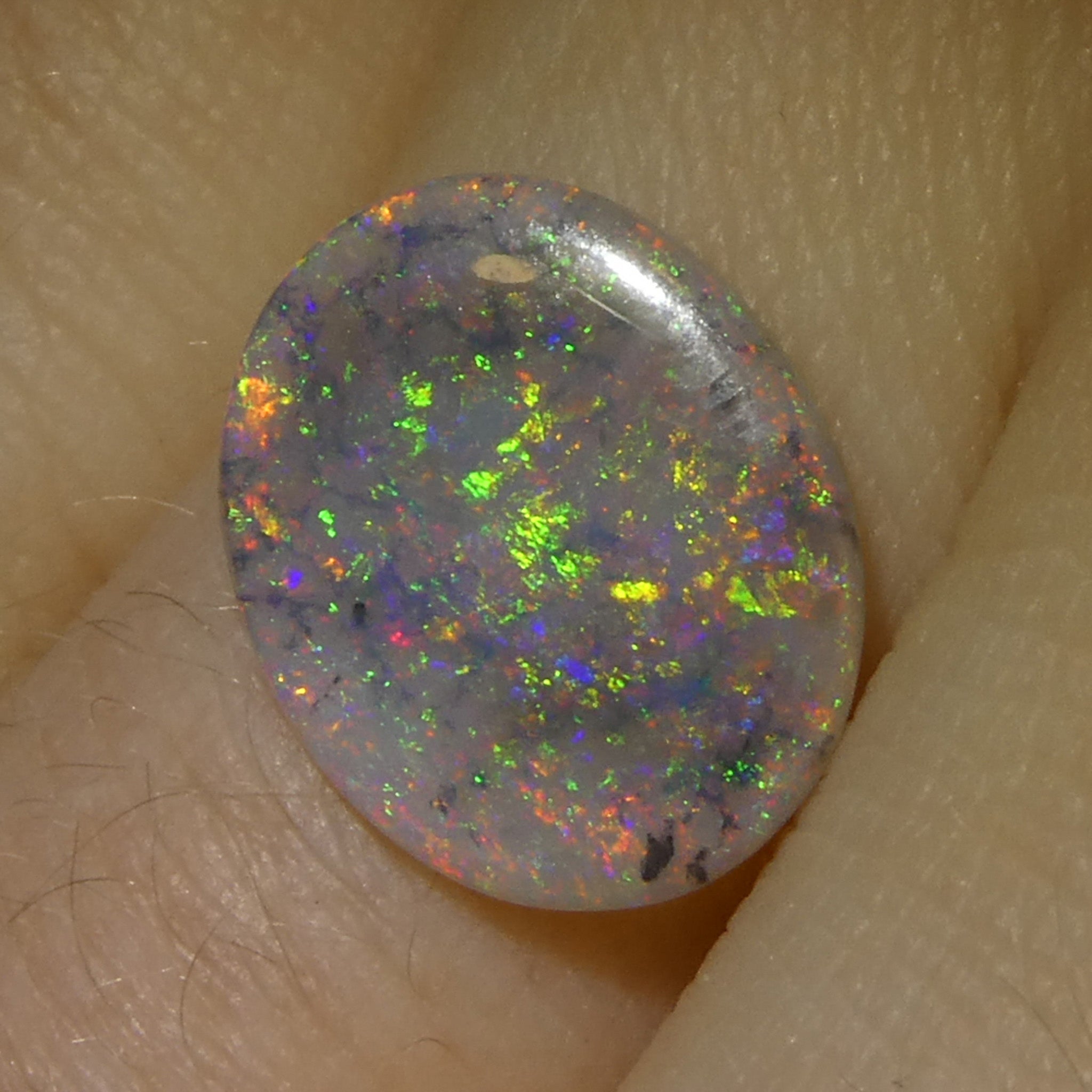 1.63ct Gray Oval Cabochon Opal from Australia, rare gemstone with play of color by SkyJems Canadian gem experts