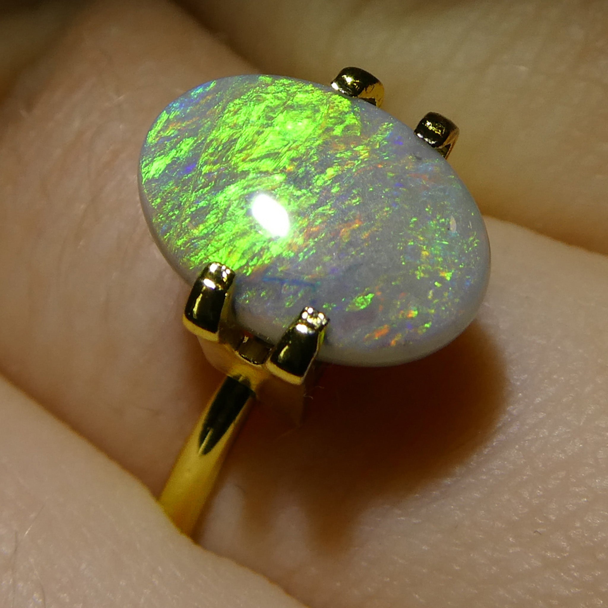 2-carat oval gray Australian opal cabochon with play of color, premium gemstone from SkyJems Canadian gem specialists