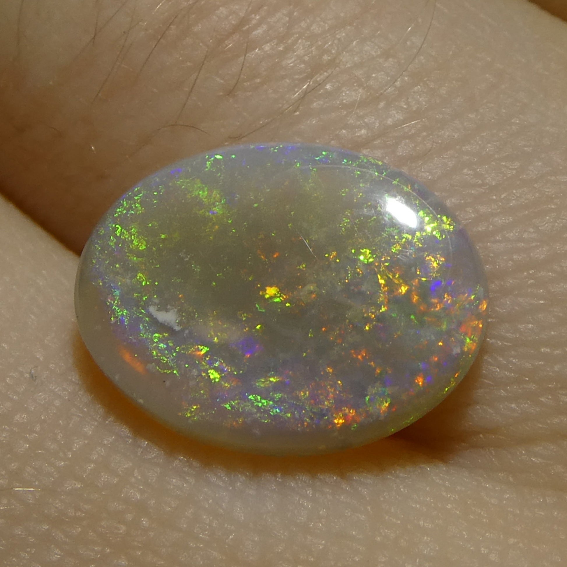 2.15ct Oval Cabochon White Opal from Australia - Skyjems Wholesale Gemstones