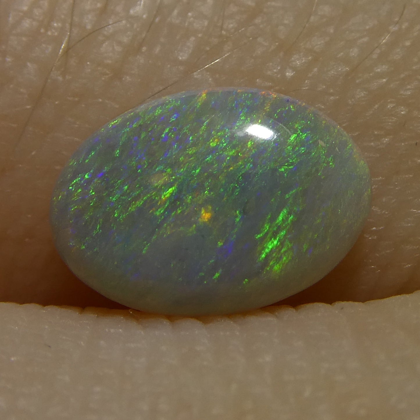 0.66ct Oval Cabochon Gray Opal from Australia - Skyjems Wholesale Gemstones