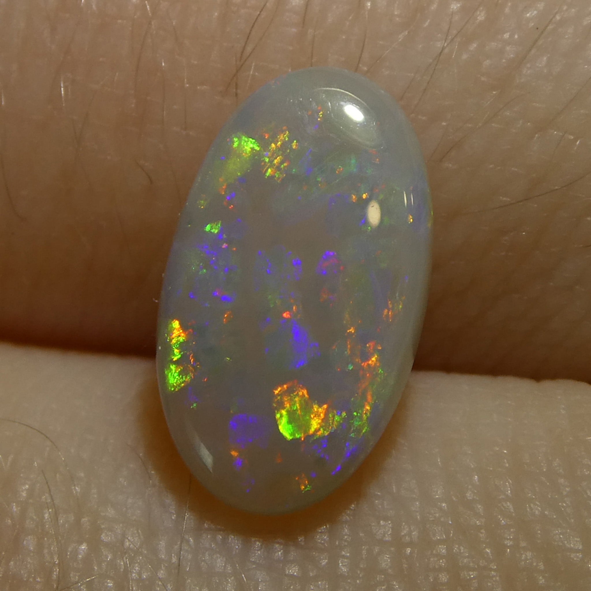 1.32ct White Opal Cabochon from Australia with Play of Color | Premium Gemstone by SkyJems Canadian Gem Experts