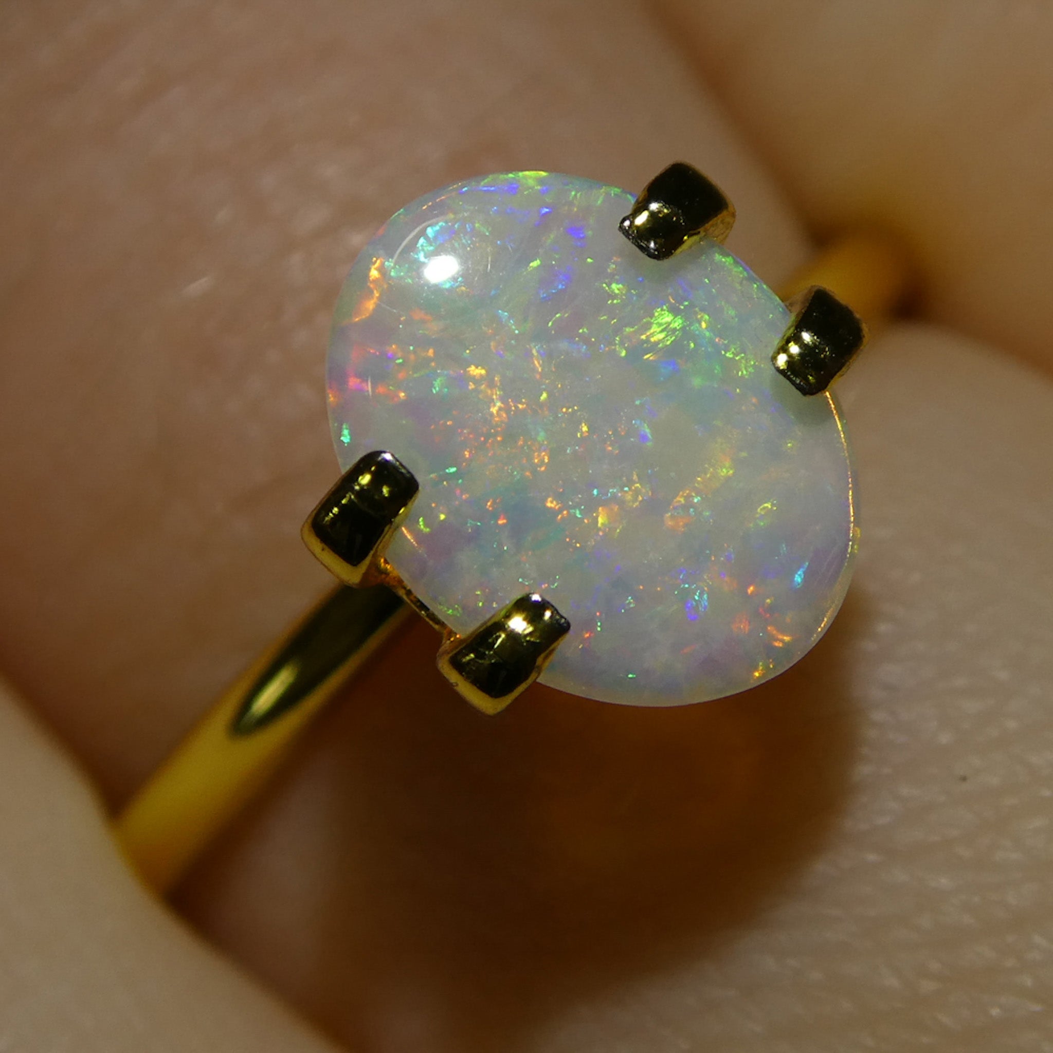 0.55ct White Oval Cabochon Opal from Australia, premium gemstone by SkyJems Canadian gem specialists