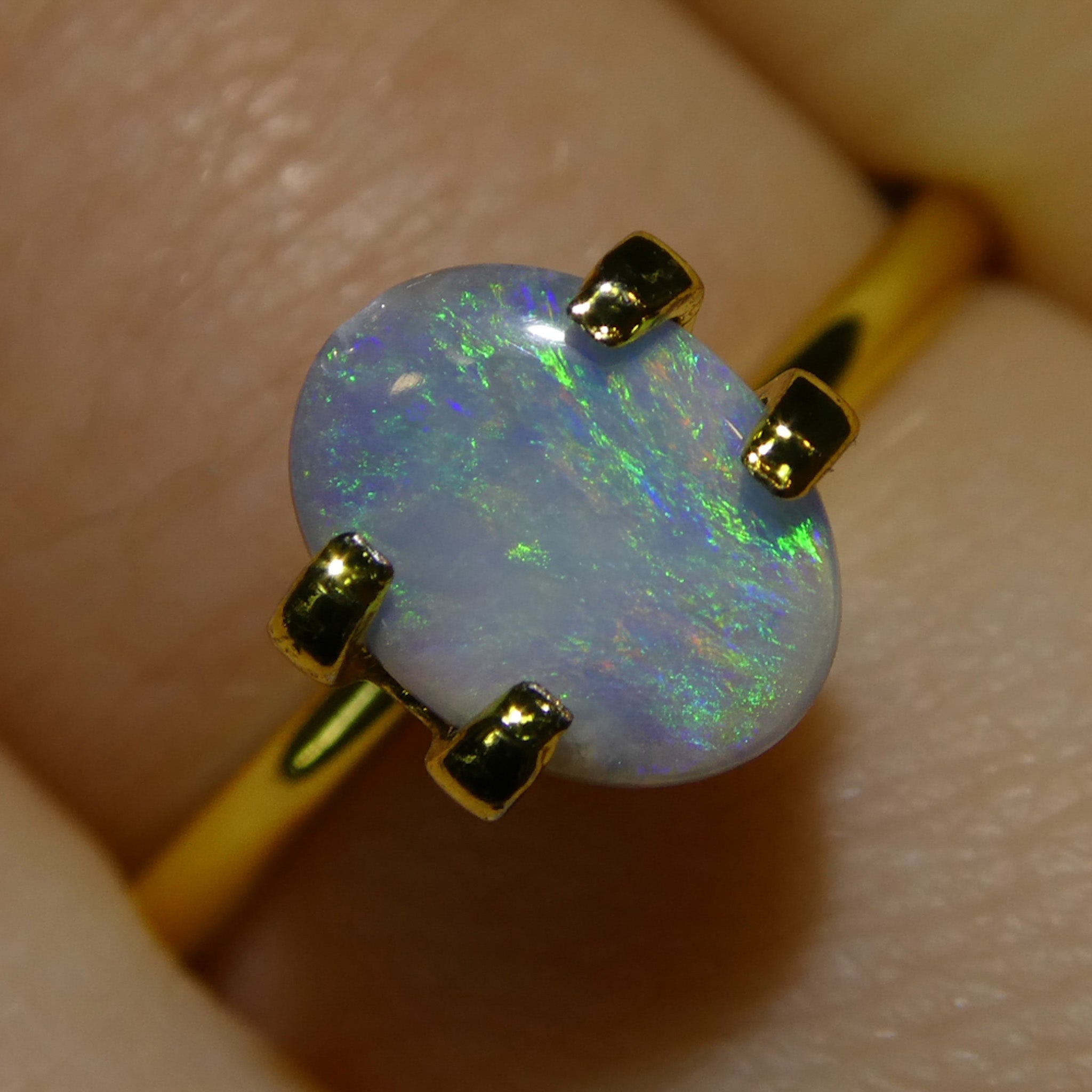 0.47ct White Oval Cabochon Opal from Australia, multi-color play of light, premium gemstone by SkyJems Canadian gem experts