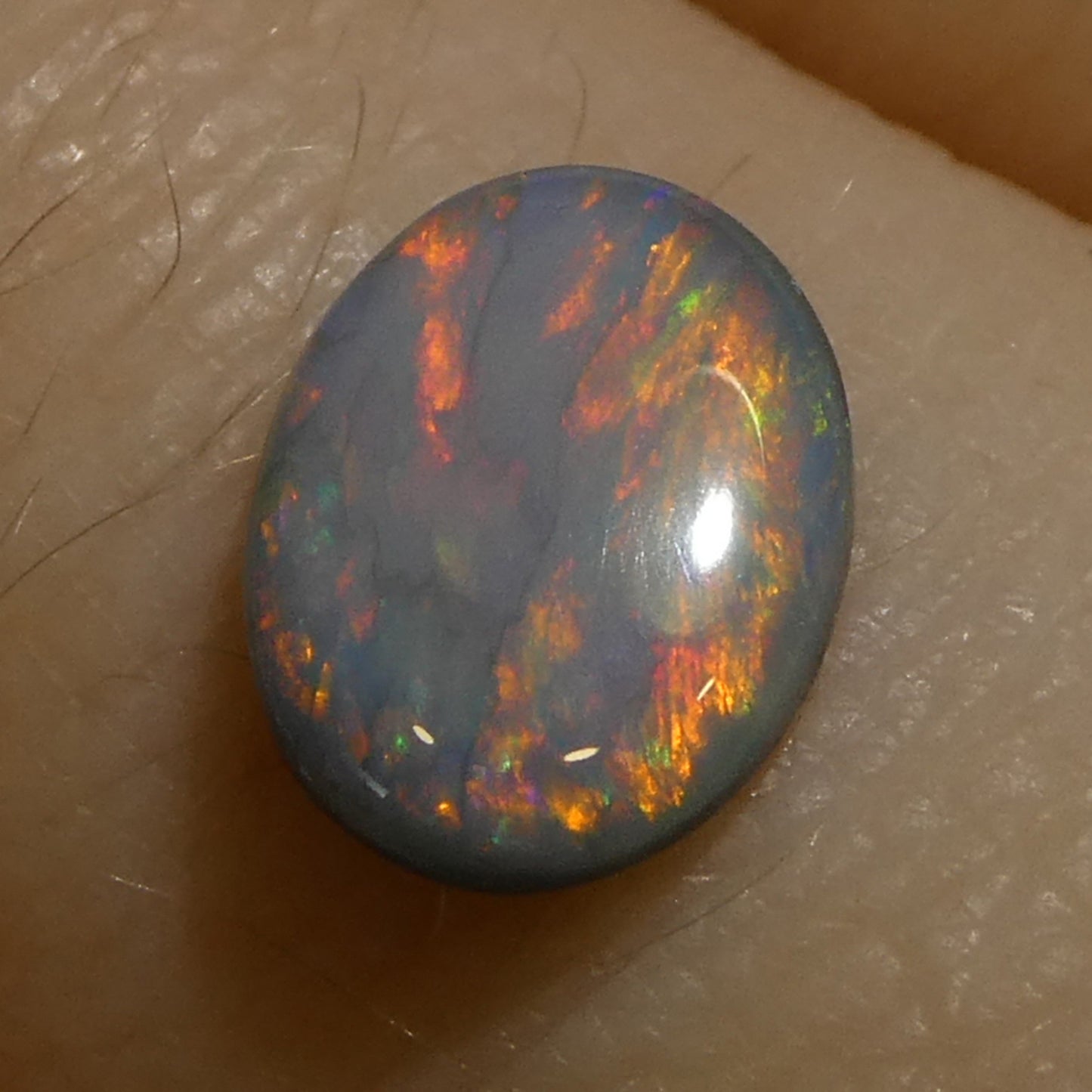 0.57ct Oval Cabochon Gray Opal from Australia - Skyjems Wholesale Gemstones