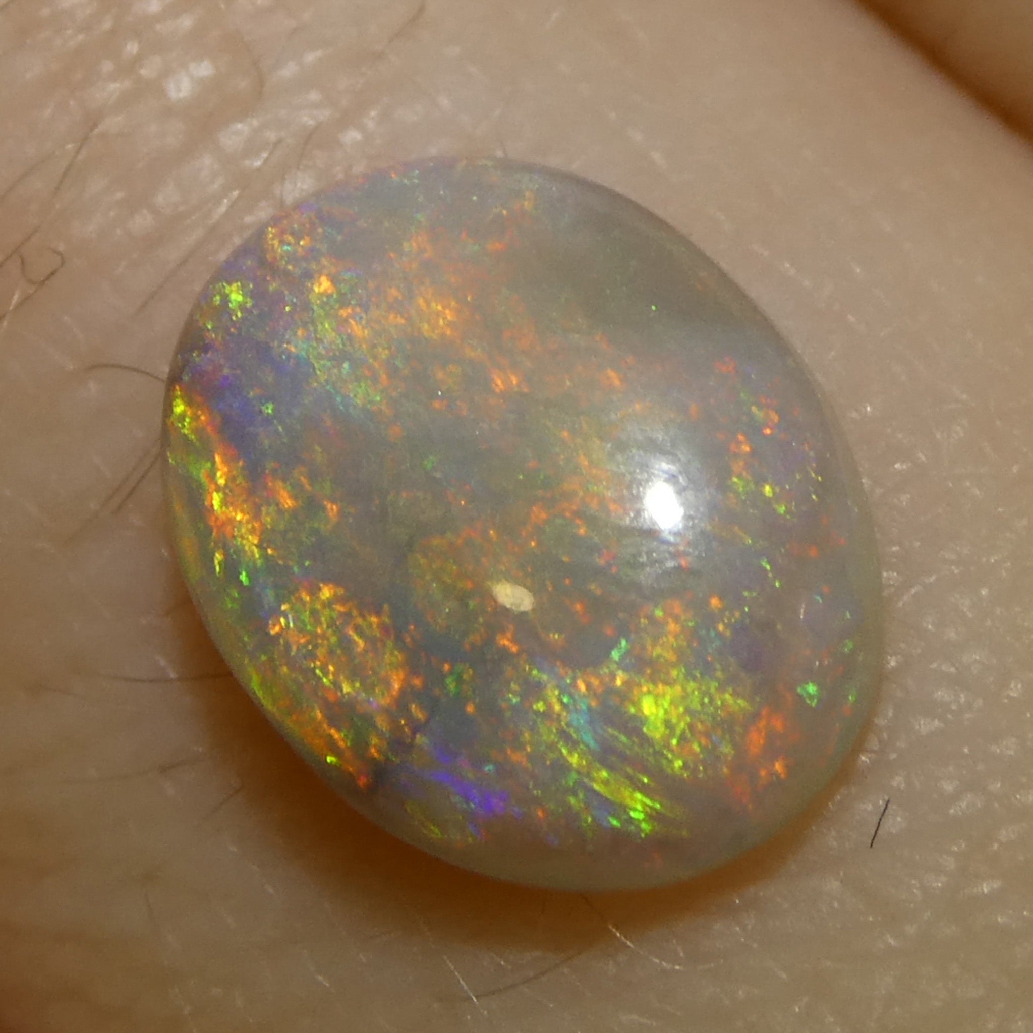 SkyJems 1.01ct White Opal Cabochon from Australia with Vibrant Play of Color, Oval Cut Gemstone
