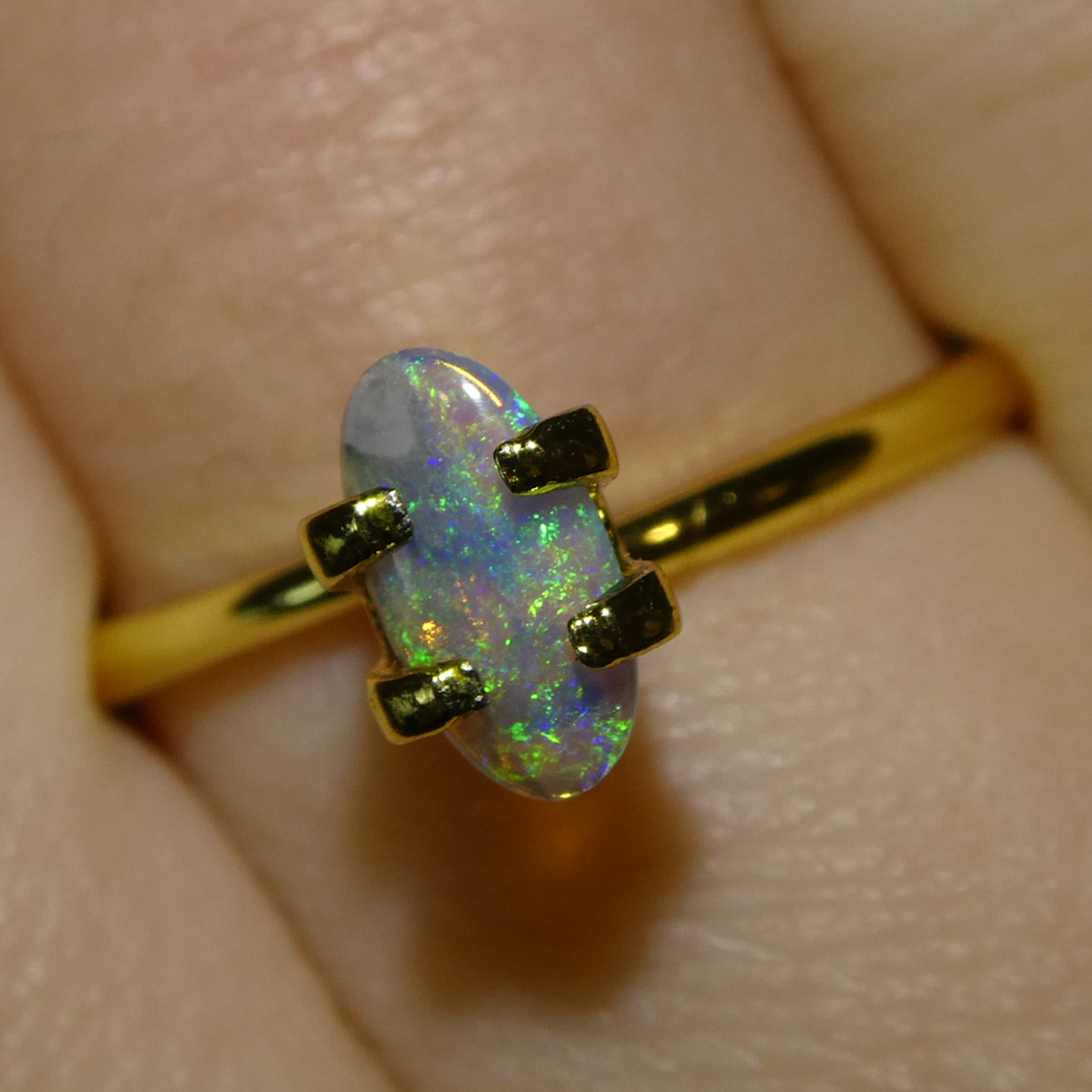 0.29ct White Opal Cabochon with Play of Color from Australia, premium gemstone by SkyJems Canadian gem specialists