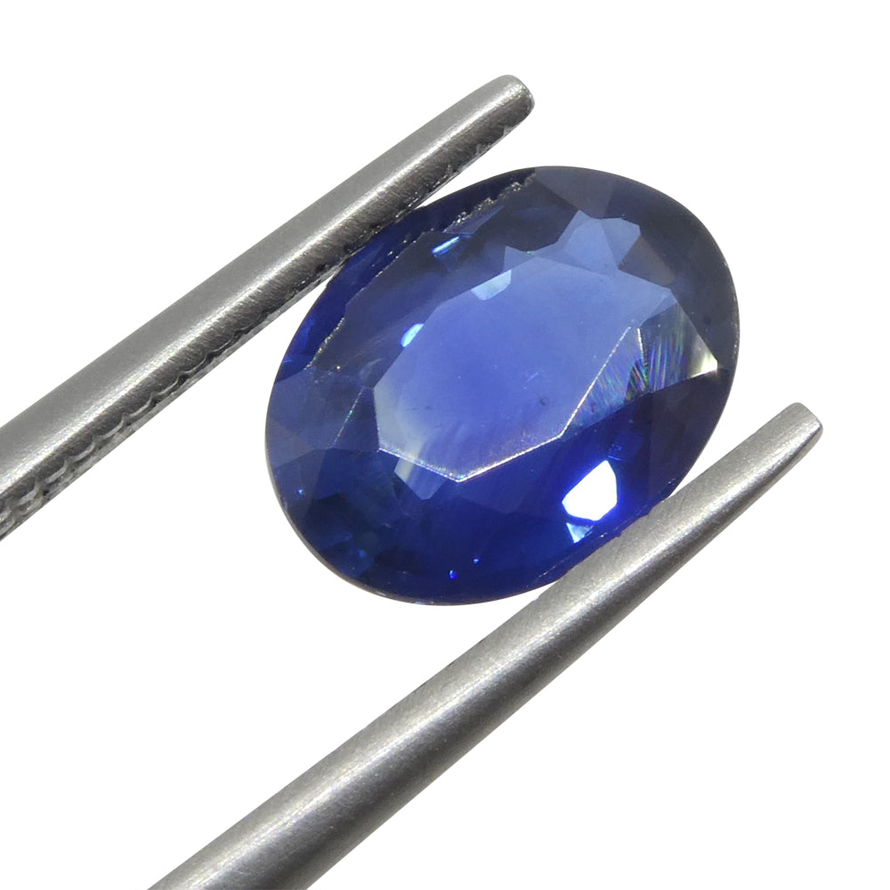 2-carat oval blue sapphire from Thailand, deep blue corundum gemstone by SkyJems Canadian gem specialists