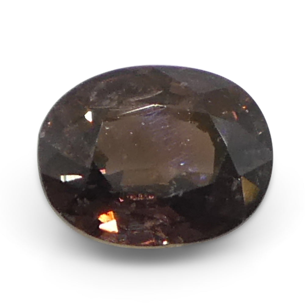 1.49ct Tanzanian Brownish Pink Oval Sapphire, heated natural gemstone from SkyJems' premium single-stone collection