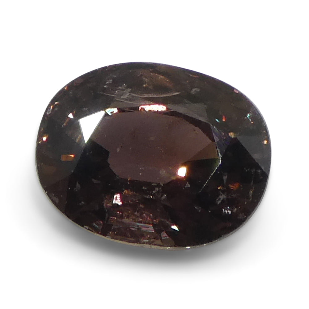 1.49ct Tanzanian Brownish Pink Oval Sapphire, heated natural gemstone from SkyJems' premium colored stone collection