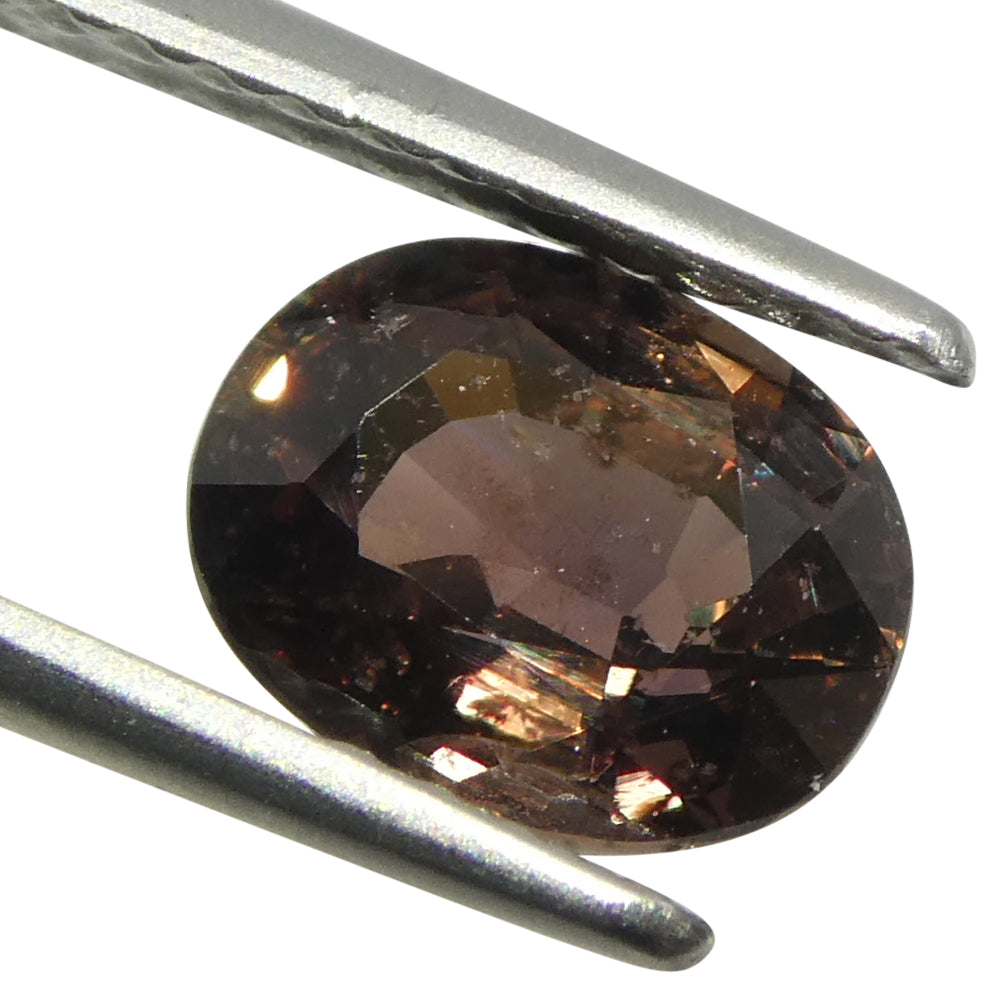 1.49ct Oval Brownish Pink Sapphire from Tanzania - Skyjems Wholesale Gemstones