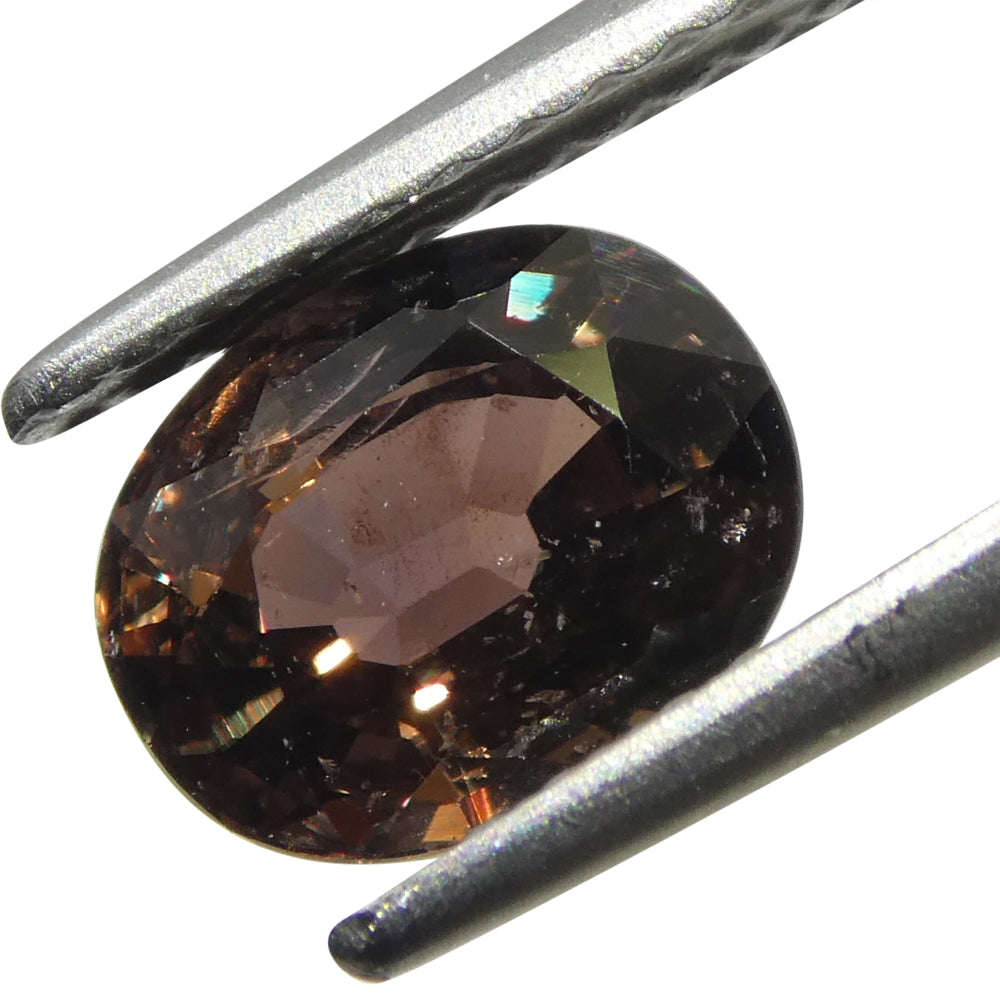 1.49ct Oval Brownish Pink Tanzanian Sapphire, heated single stone from SkyJems' premium colored gemstone collection
