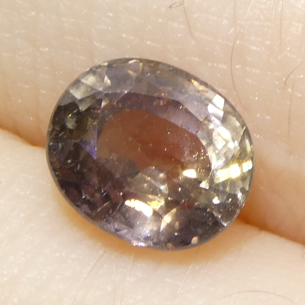 1.76ct Greyish Pink Tanzanian Sapphire, oval-cut single stone from SkyJems' premium colored gemstone collection