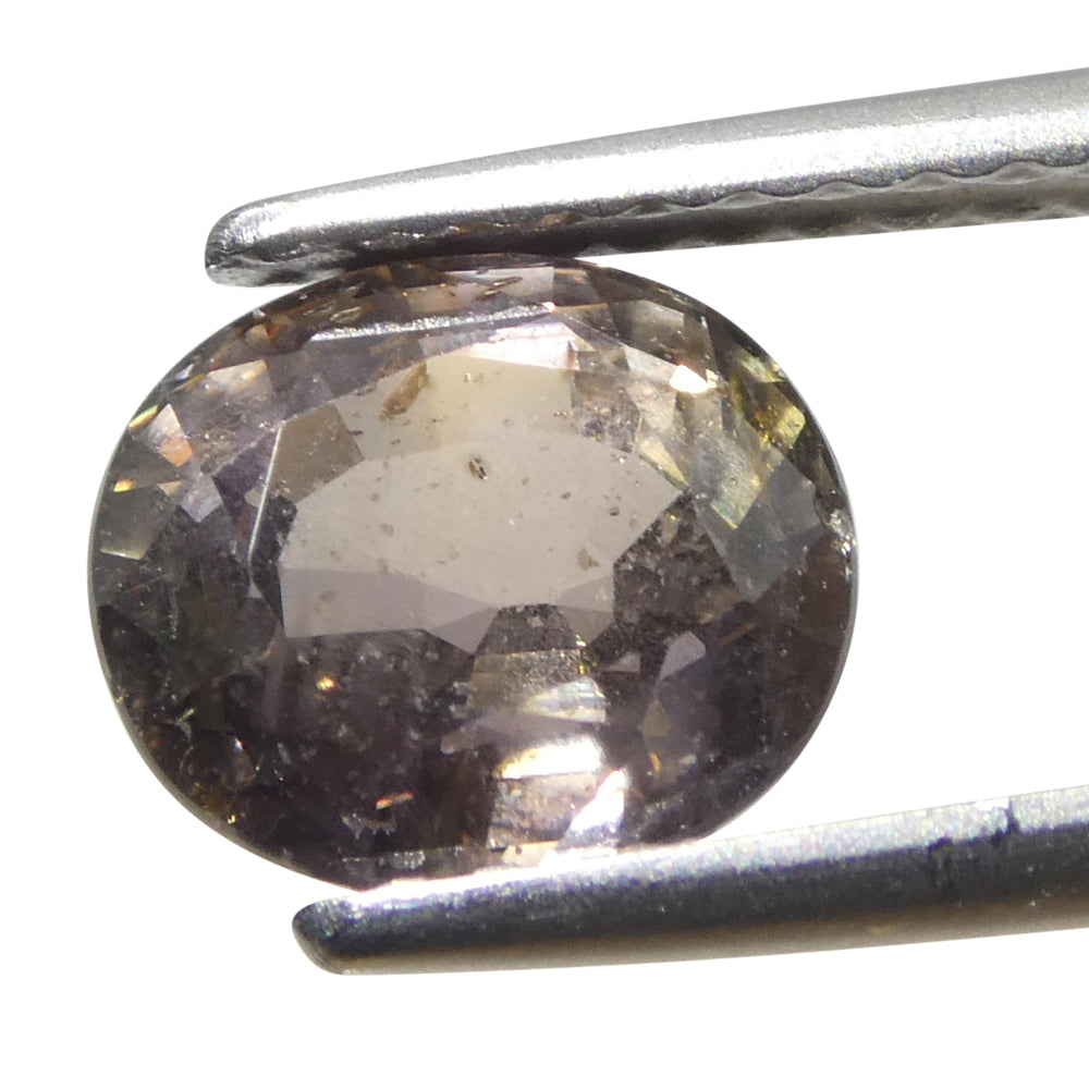 1.76ct Greyish Pink Tanzanian Sapphire, oval-cut single stone from SkyJems' premium colored gemstone collection