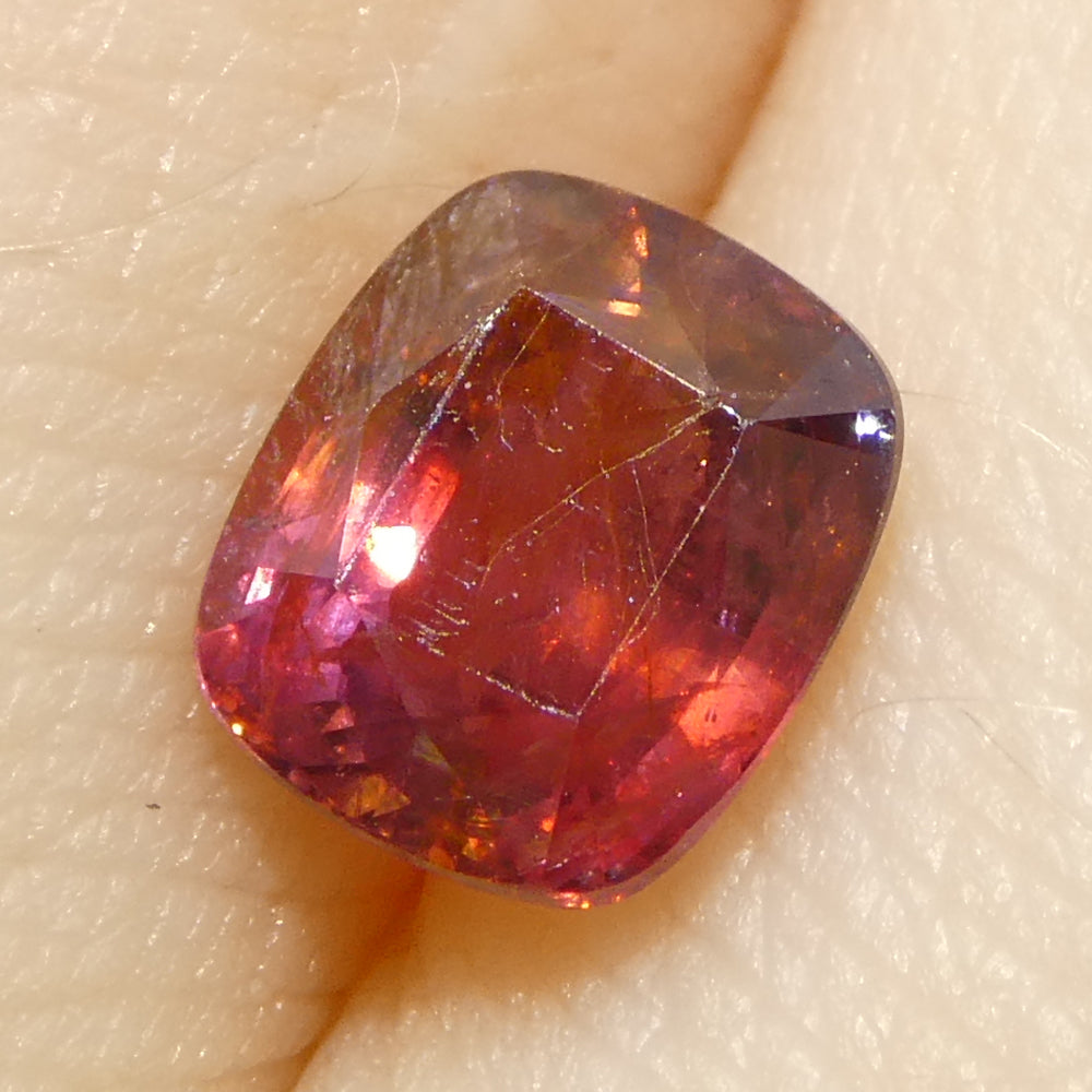 1.31ct Tanzanian Orangy Red Cushion Sapphire, premium Step Cut gemstone from SkyJems' rare single-stone collection