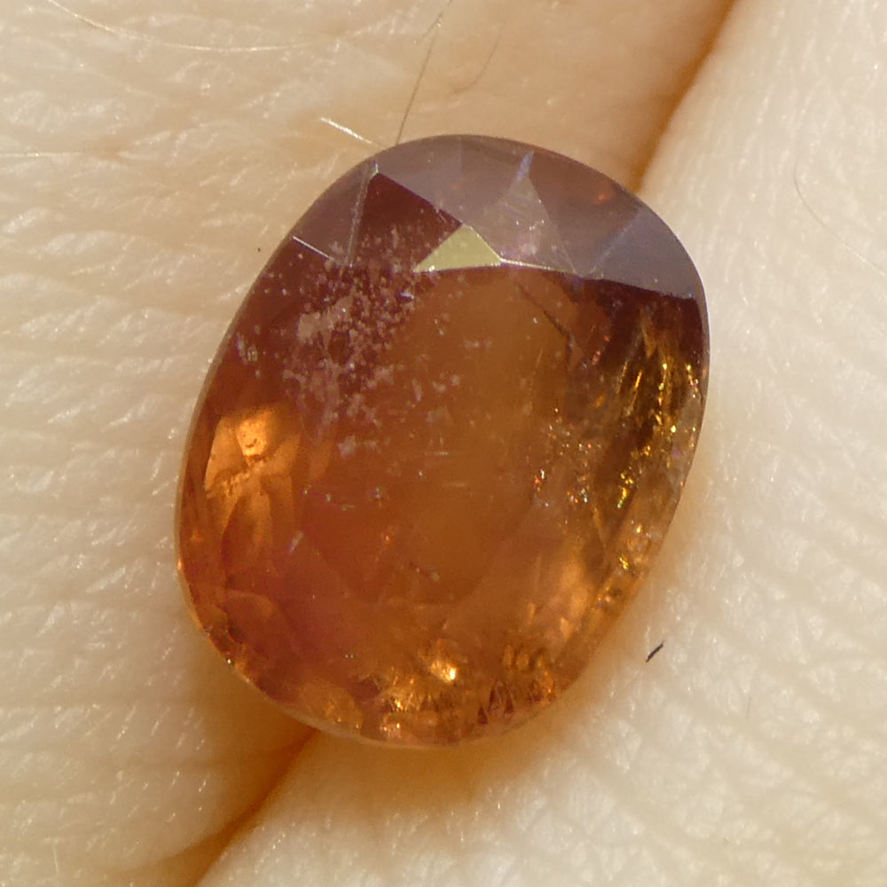 1.67ct Tanzanian Orange Sapphire, cushion-cut, warm reddish hue | Premium loose gemstone by SkyJems Canadian gem experts