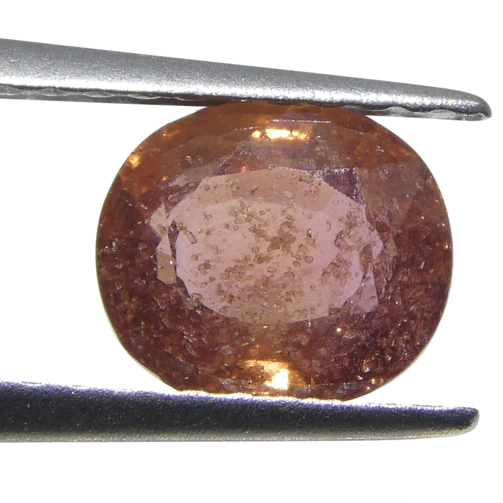 1.4ct Tanzanian Pink Sapphire, cushion-cut, medium-light orangey pink gemstone from SkyJems Canadian gem specialists