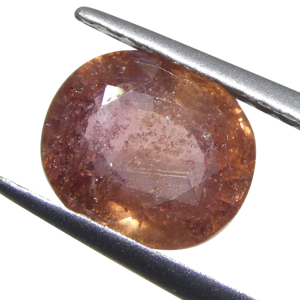 1.4ct Tanzanian Pink Sapphire, cushion-cut, medium-light orangey pink gemstone from SkyJems Canadian gem specialists