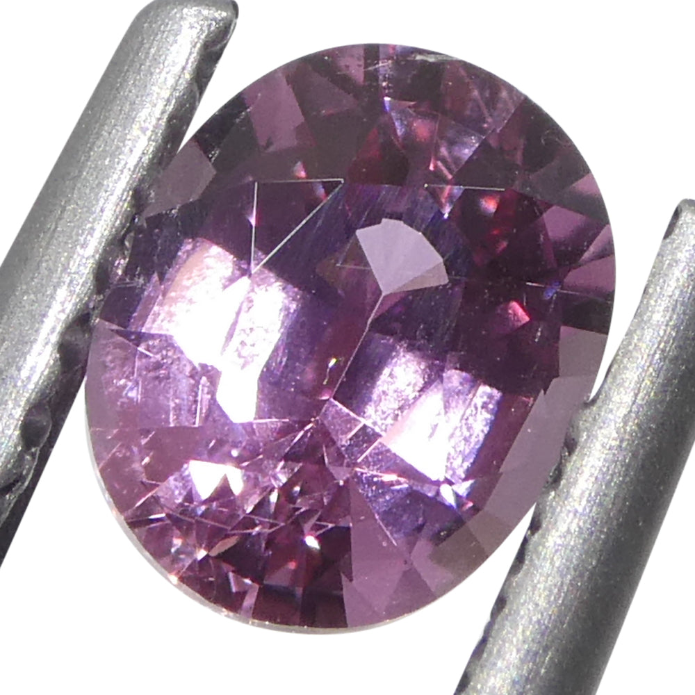 0.69ct Oval Pink Sapphire from Madagascar, purplish pink gemstone by SkyJems, premium Canadian colored gem specialists
