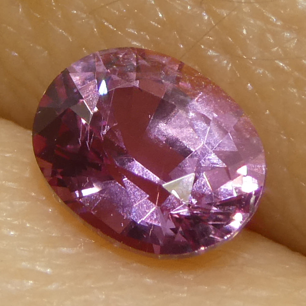 0.69ct Oval Pink Sapphire from Madagascar, purplish pink gemstone by SkyJems, premium Canadian colored gem specialists