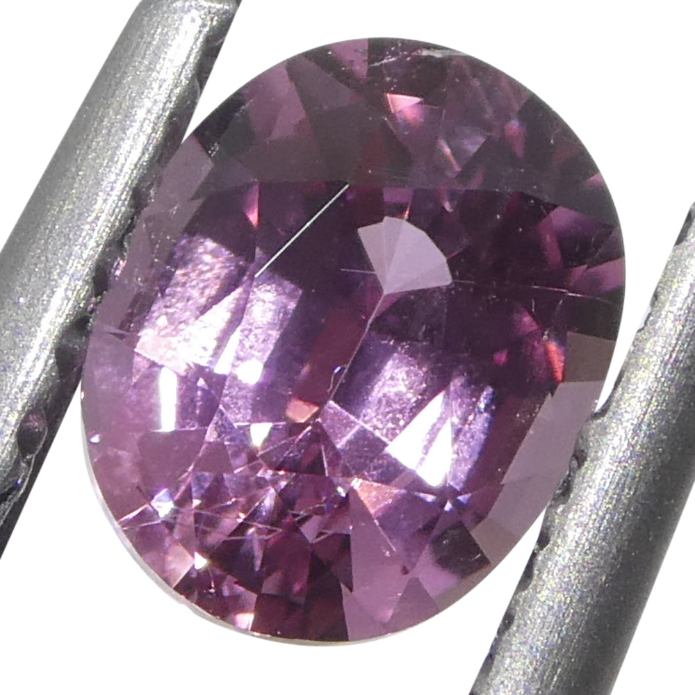 0.69ct Oval Pink Sapphire from Madagascar, Purplish Pink Corundum gemstone by SkyJems Canadian gem specialists