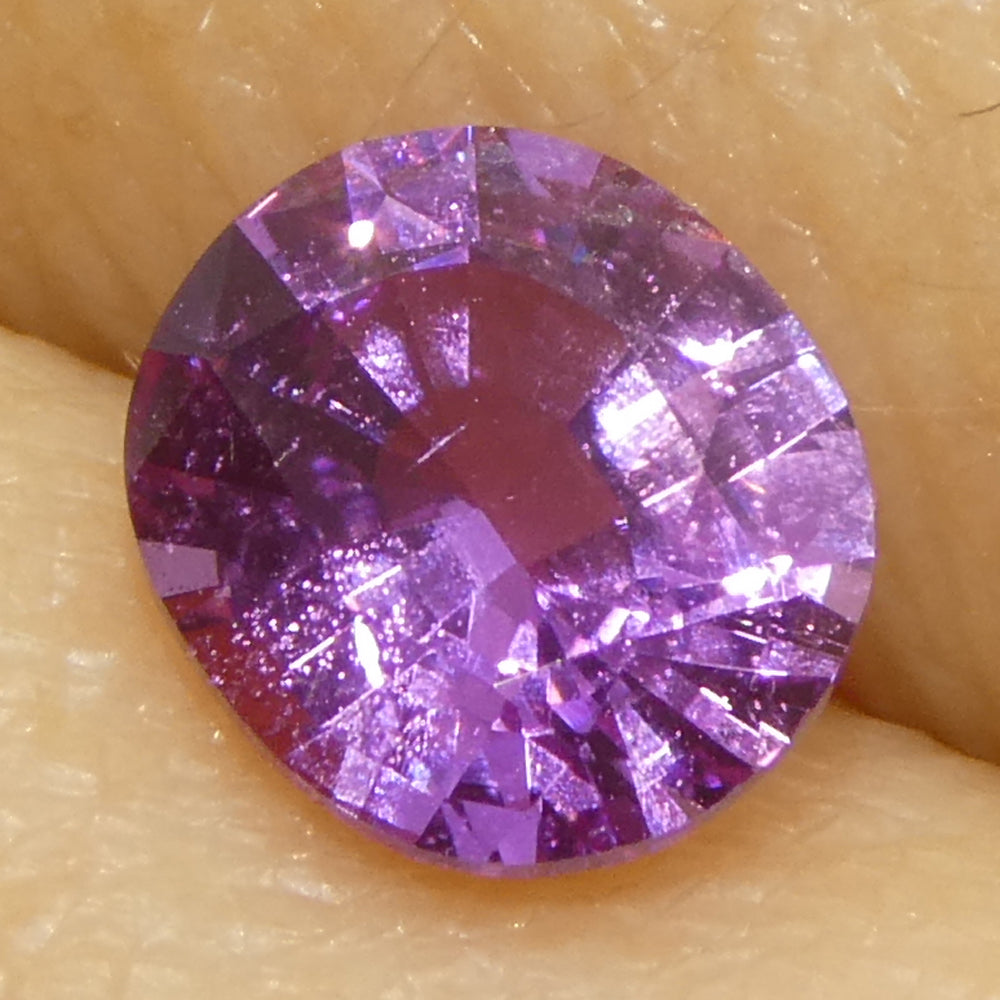 0.76ct Oval Pink Sapphire from Madagascar, vibrant medium-strong color, precision-cut by SkyJems Canadian gemstone experts si