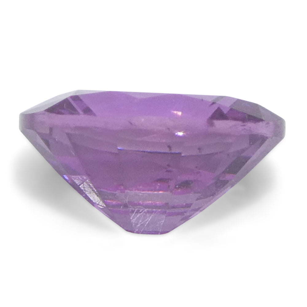 0.76ct Oval Pink Sapphire from Madagascar, vibrant medium-strong pink hue, precision-cut by SkyJems Canadian gemstone experts