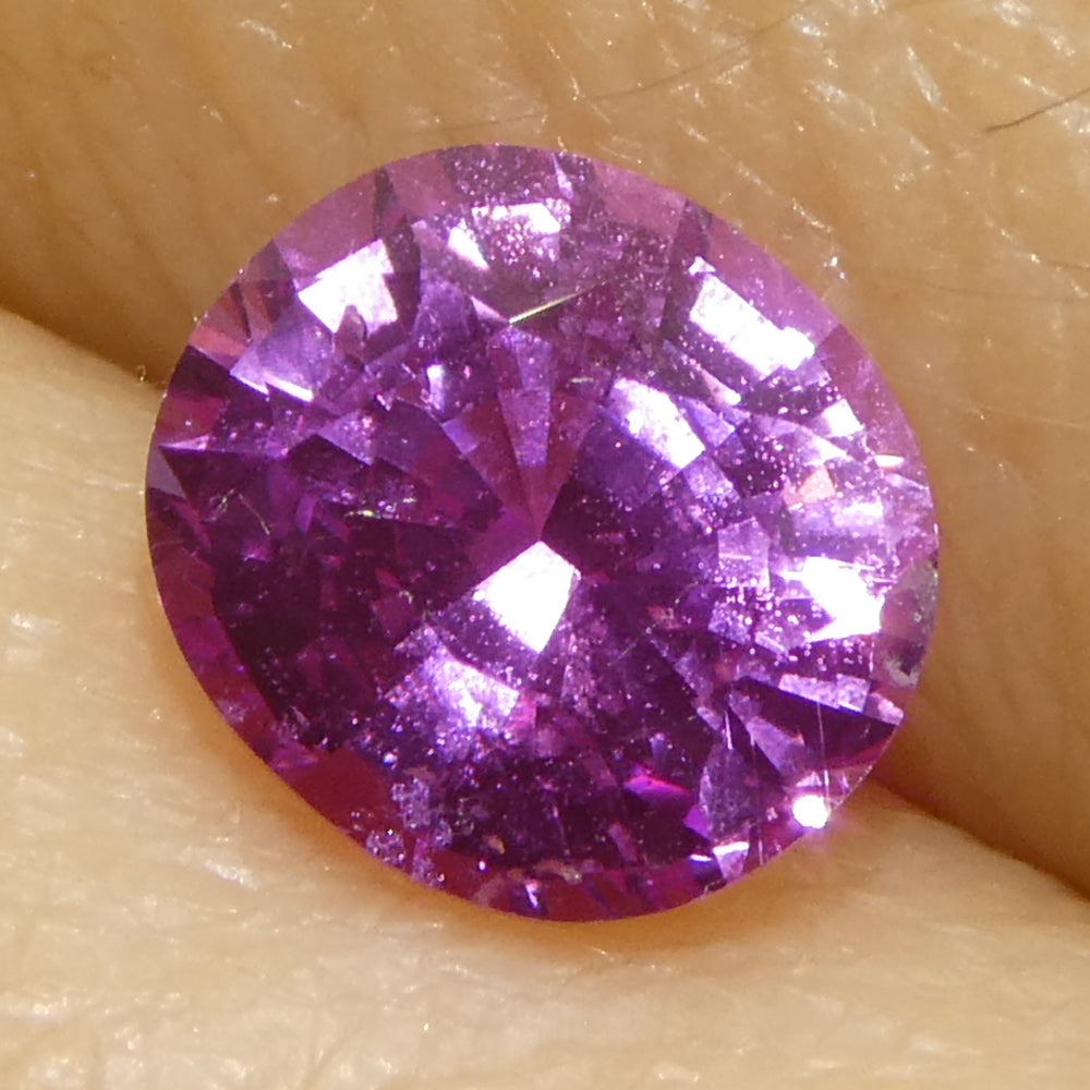 0.99ct Oval Purple-Pink Madagascar Sapphire, vivid medium tone, Step Cut gemstone by SkyJems Canadian gem specialists