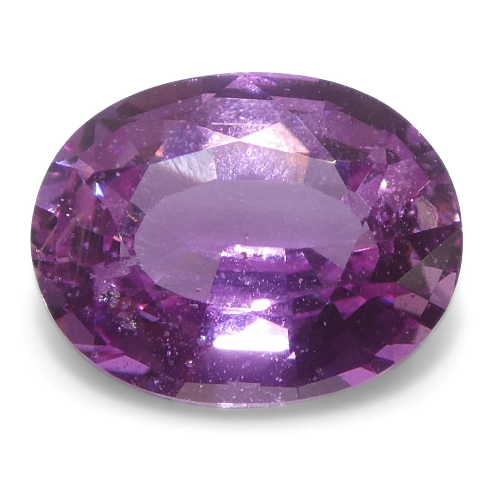 0.99ct Oval Purple-Pink Madagascar Sapphire from SkyJems, premium heated gemstone in classic oval shape and vibrant color
