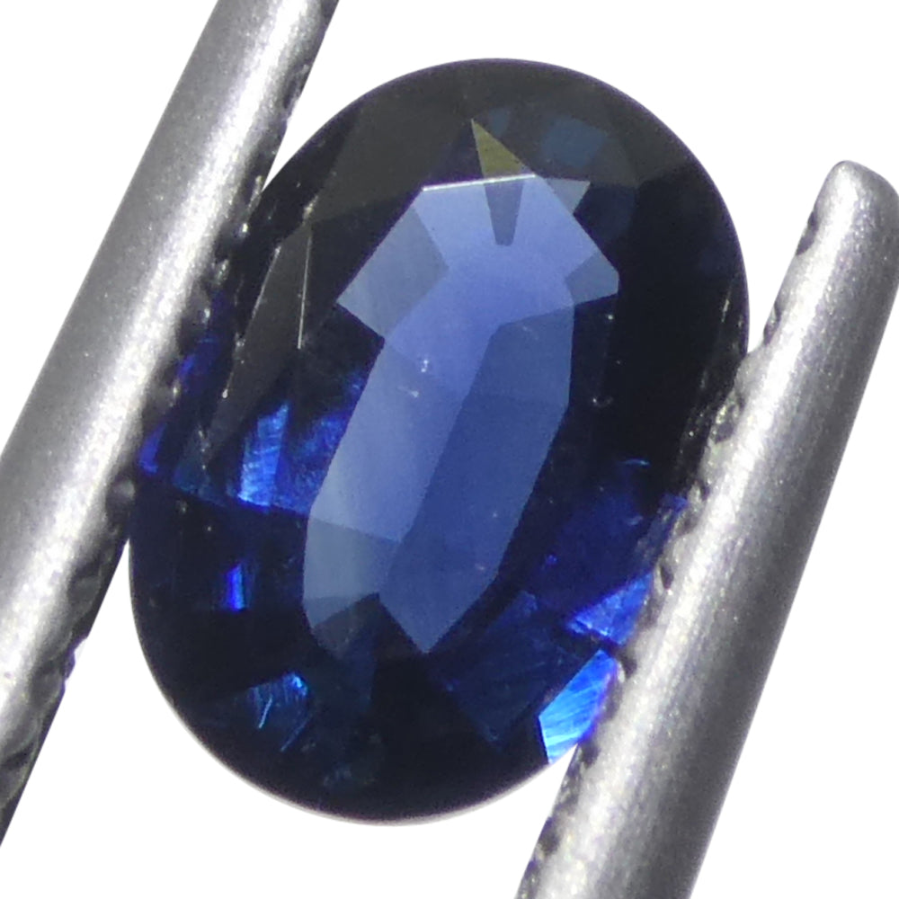 0.73ct Oval Blue Sapphire from Madagascar, very slightly purplish, Step Cut gemstone by SkyJems Canadian gem experts