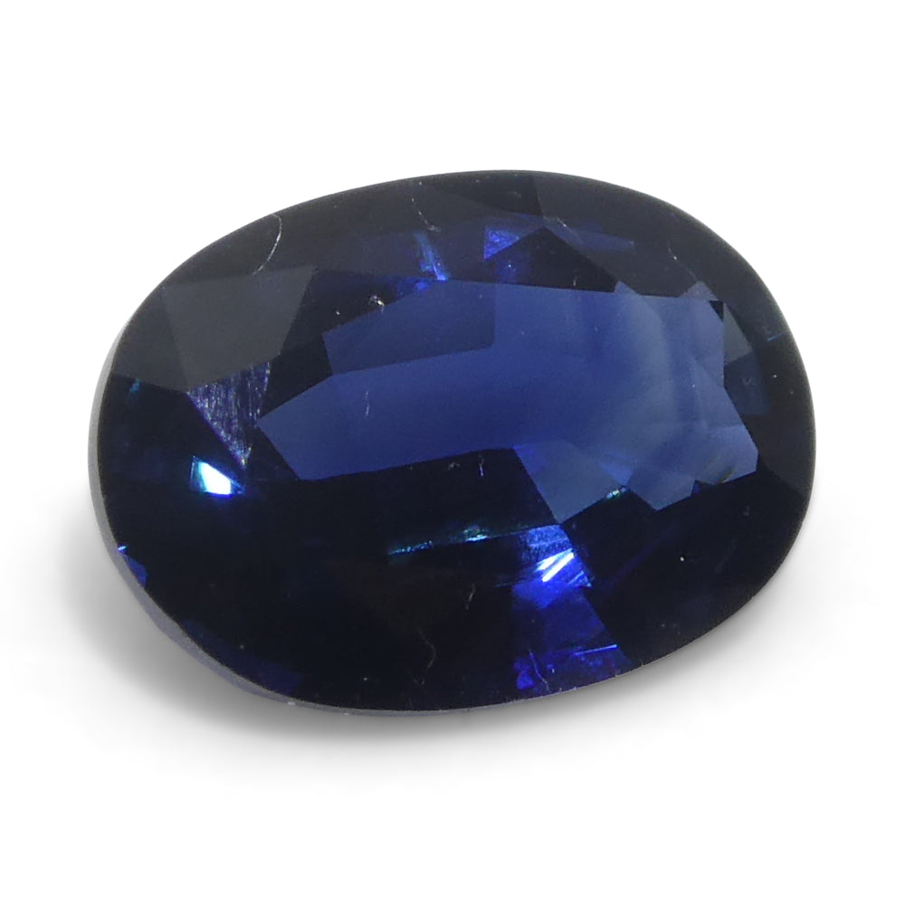 0.73ct Oval Blue Sapphire from Madagascar, very slightly purplish blue, Step Cut gemstone by SkyJems Canadian gem experts