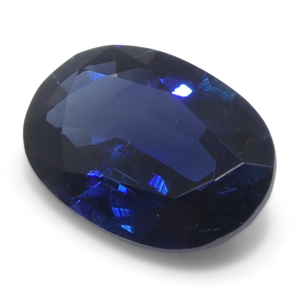 0.73ct Oval Blue Sapphire from Madagascar, very slightly purplish, Step Cut gemstone by SkyJems Canadian gem specialists