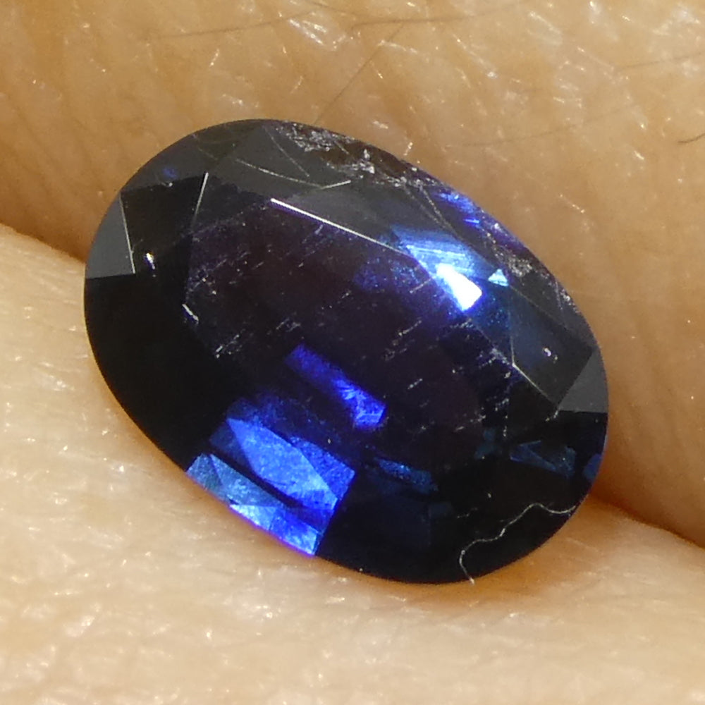 0.73ct Oval Blue Sapphire from Madagascar, very slightly purplish, Step Cut gemstone by SkyJems Canadian gem experts