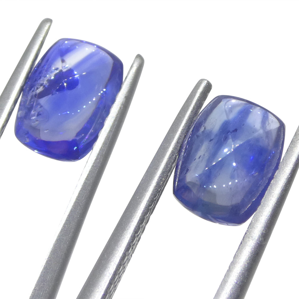 Sapphire 2.53 cts 7.4 x 5.5 x 3.37 mm and 7.4 x 5.5 x 3.06 mm Cushion Sugarloaf Cabochon slightly purplish Blue  $2030