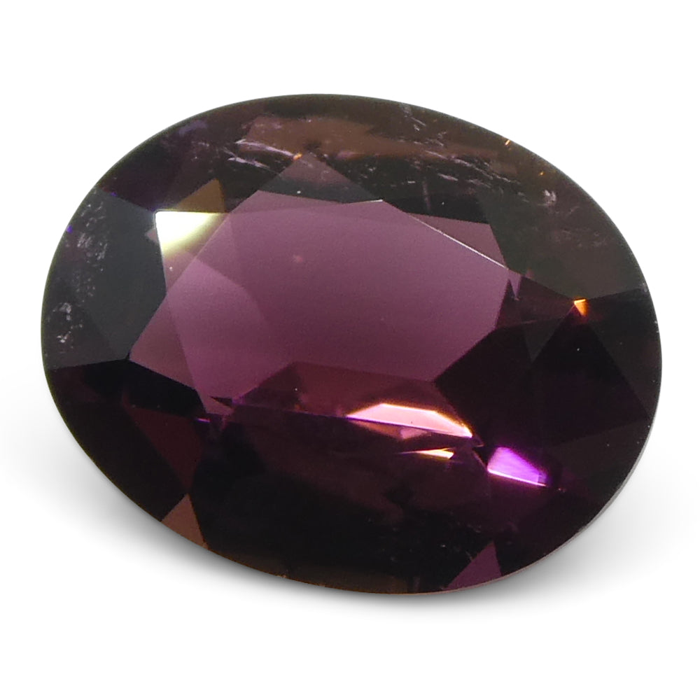 2.1ct Oval Pink Tourmaline from Brazil, slightly orangy pink gemstone by SkyJems Canadian gem specialists