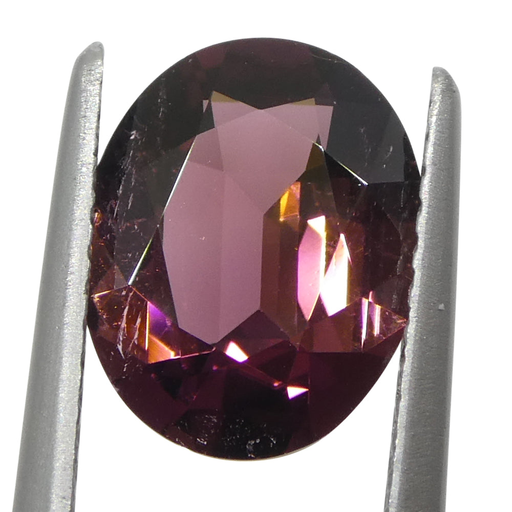 2.1ct Oval Pink Tourmaline from Brazil, slightly orangy pink gemstone by SkyJems Canadian gem specialists