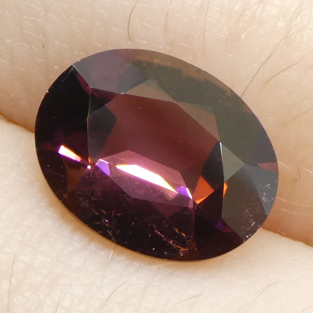 2.1ct Oval Pink Tourmaline from Brazil, slightly orangy pink gemstone by SkyJems Canadian gem specialists