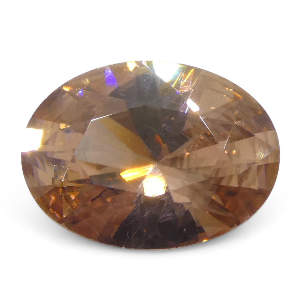 2.31ct Oval Orange-Pink Zircon from Sri Lanka, earth-mined brilliant cut gemstone by SkyJems Canadian gem specialists