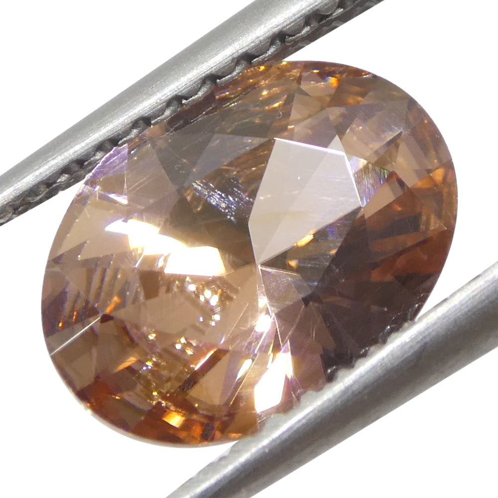 2.31ct Natural Earth Mined Oval Master Brilliant Cut Orange-Pink Zircon from Sri Lanka - Skyjems Wholesale Gemstones