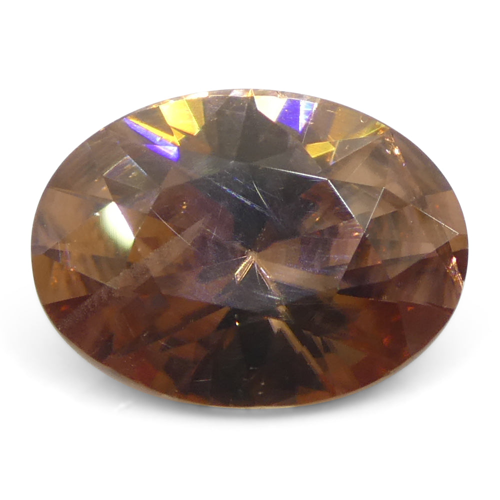 2.16ct Oval Orange-Pink Zircon from Sri Lanka, earth-mined brilliant cut gemstone by SkyJems Canadian gem specialists