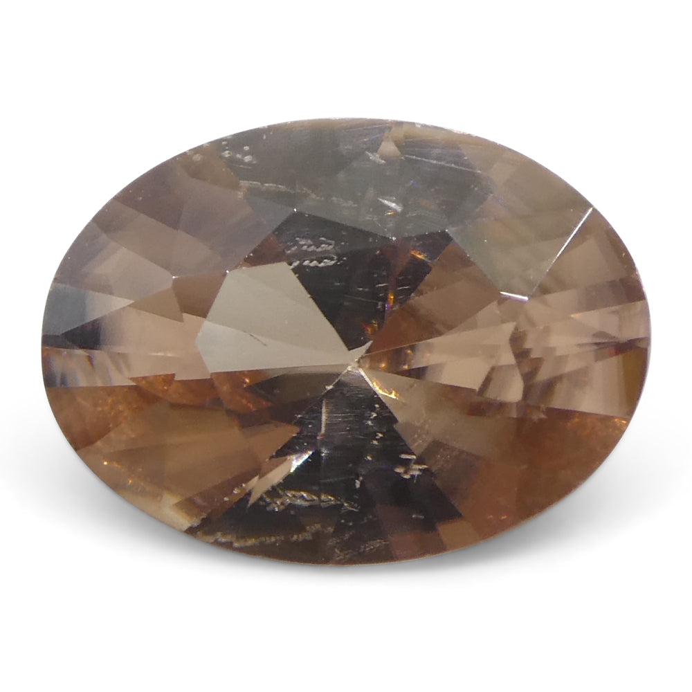 1.97ct Pink-Orange Oval Zircon from Sri Lanka, precision-cut master brilliant gemstone by SkyJems Canadian gem specialists