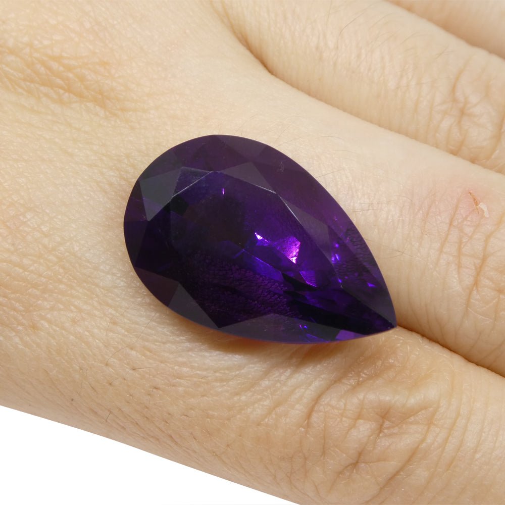 26.11 carat pear-cut purple Uruguayan amethyst from SkyJems, premium large-scale gemstone with vivid color and exceptional cl