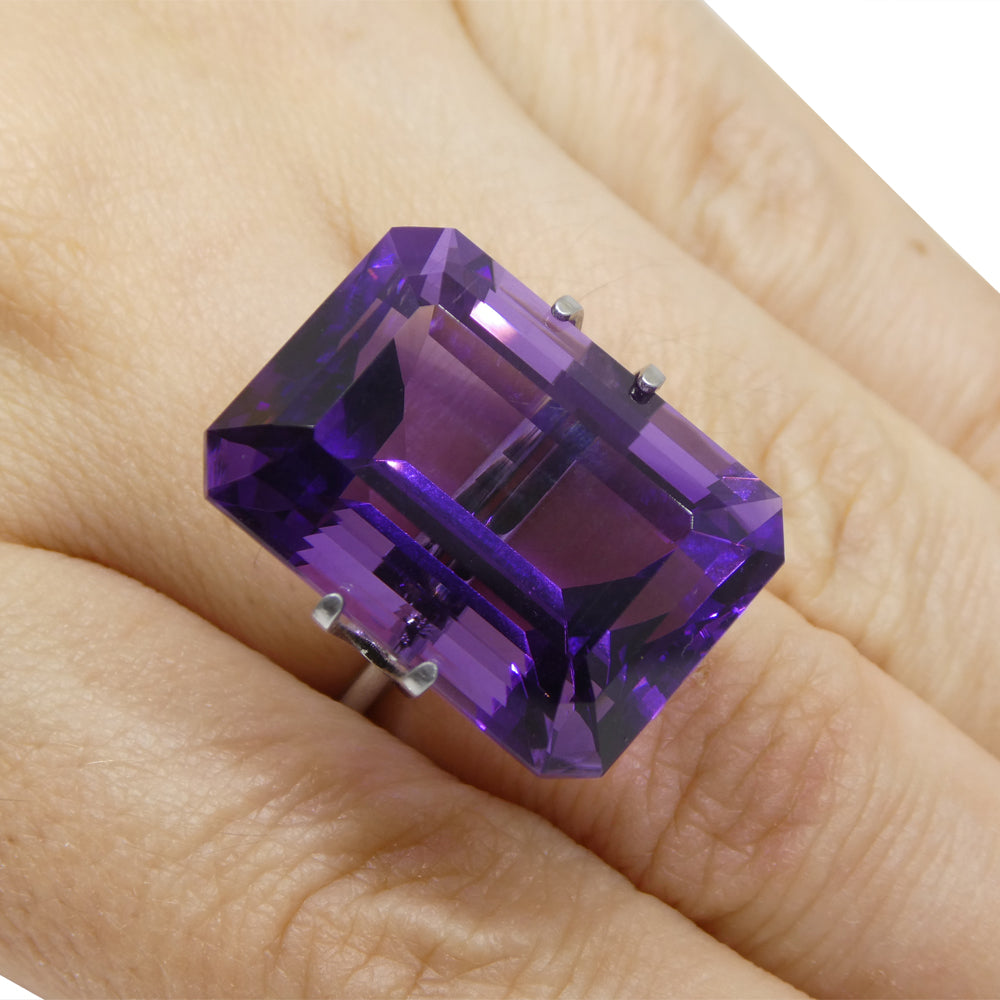 33.29 carat purple Uruguayan amethyst emerald cut gemstone from SkyJems, premium large-scale collector's quality step-cut qua